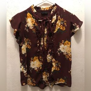 Burgundy blouse yellow flowers